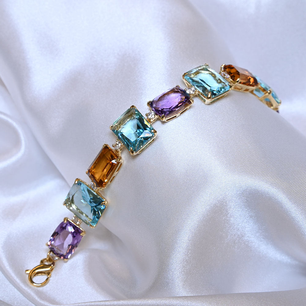 Bracciale in Argento dorato con quarzi colorati e zirconi