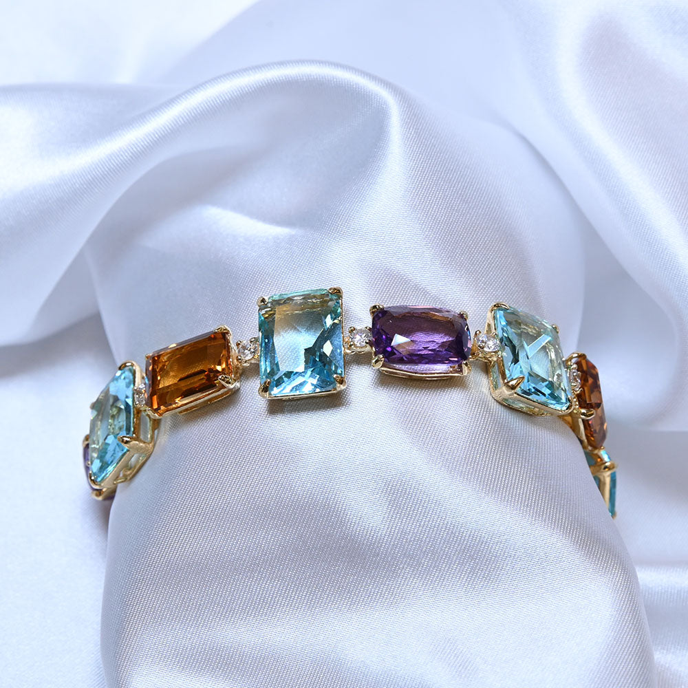 Bracciale in Argento dorato con quarzi colorati e zirconi