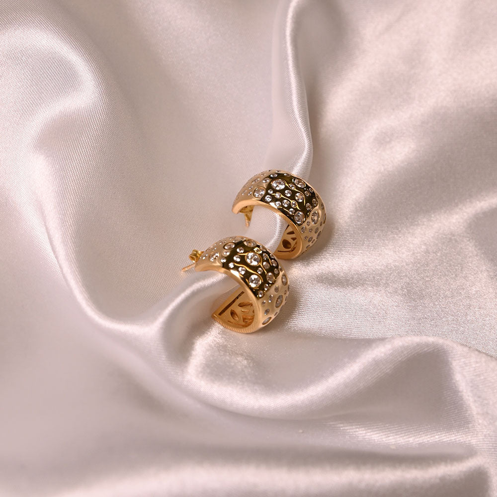 Orecchini boccole in argento dorato e zirconi